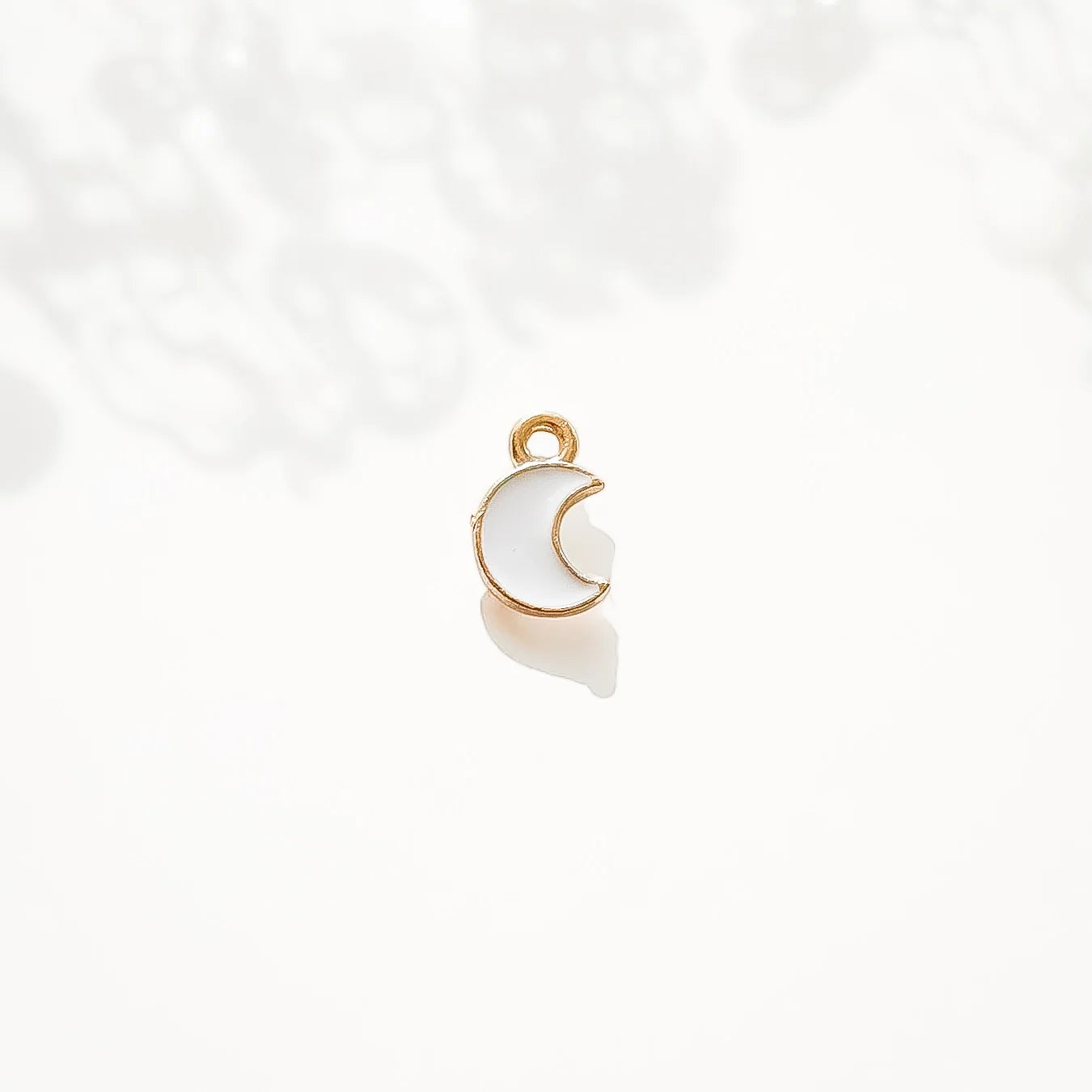 Photo du charm lune de la marque Gigi Pop