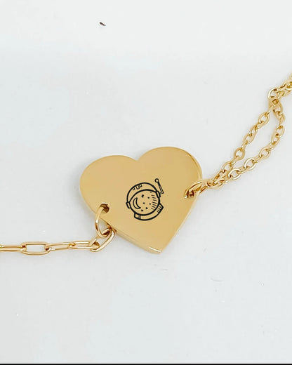 photo d'un joli bracelet plaquée or avec coeur à graver de la marque Gigi Pop