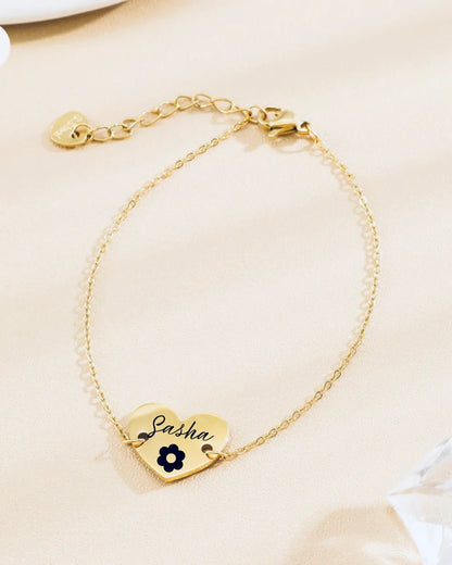 Photo d'un bracelet plaqué or avec coeur à graver