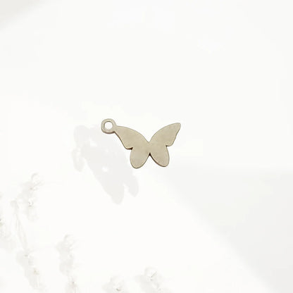 Photo d'un charm papillon en acier inoxydable plaquée argent